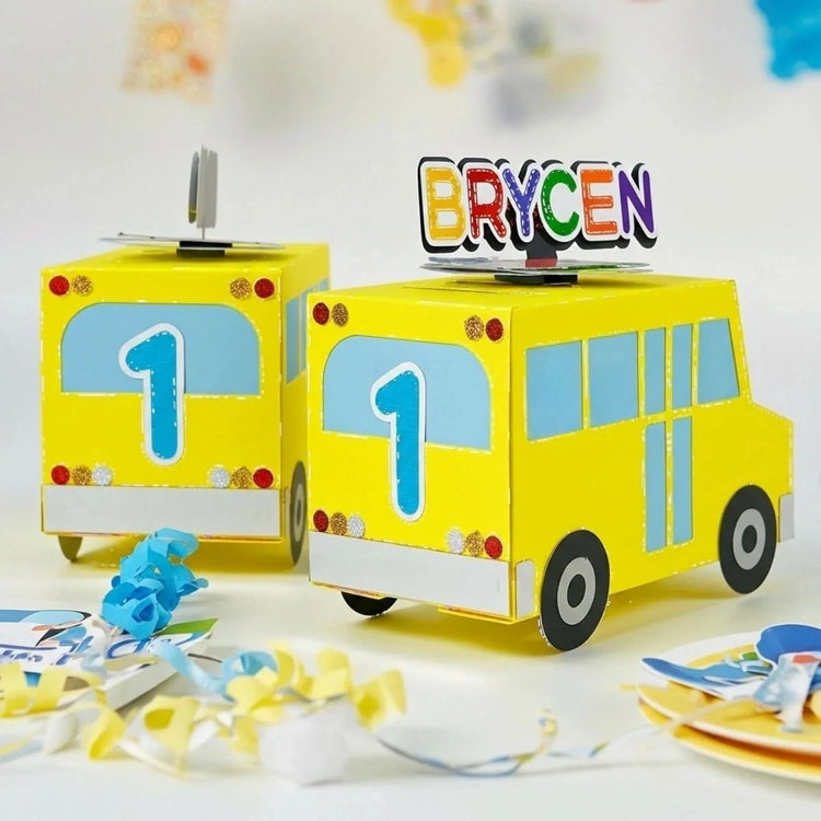 Cocomelon party favors with personalized treat boxes and kids birthday setup