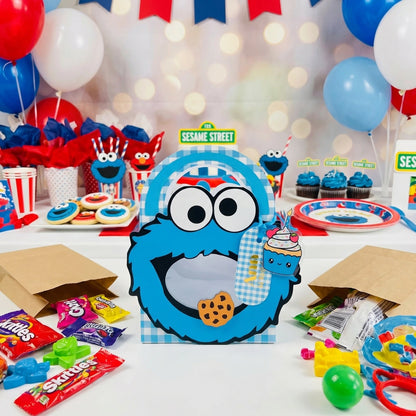 Sesame Street-themed party setup with Cookie Monster decorations and candy.