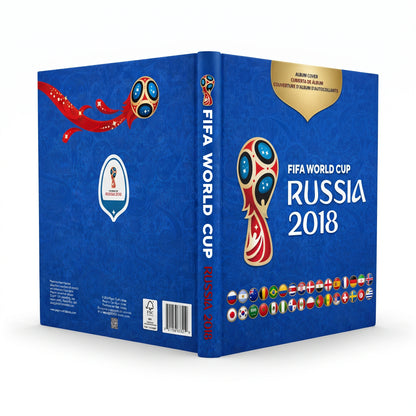 A 3D box mockup of the FIFA World Cup Russia 2018 official guide, featuring a deep blue cover with the event's logo, national flags, and a gold badge on a white background.