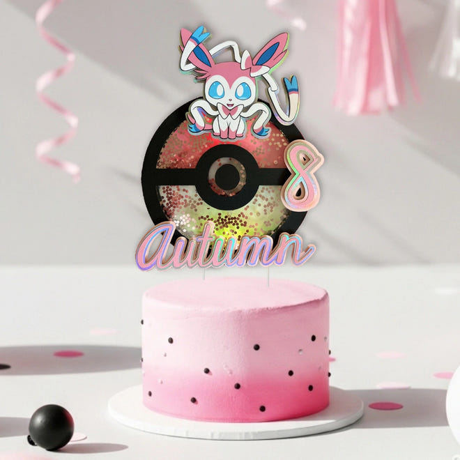 Handmade Sylveon cake topper with layered cardstock details